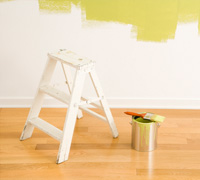 Step
ladder and bucket of paint in a home in
NYC